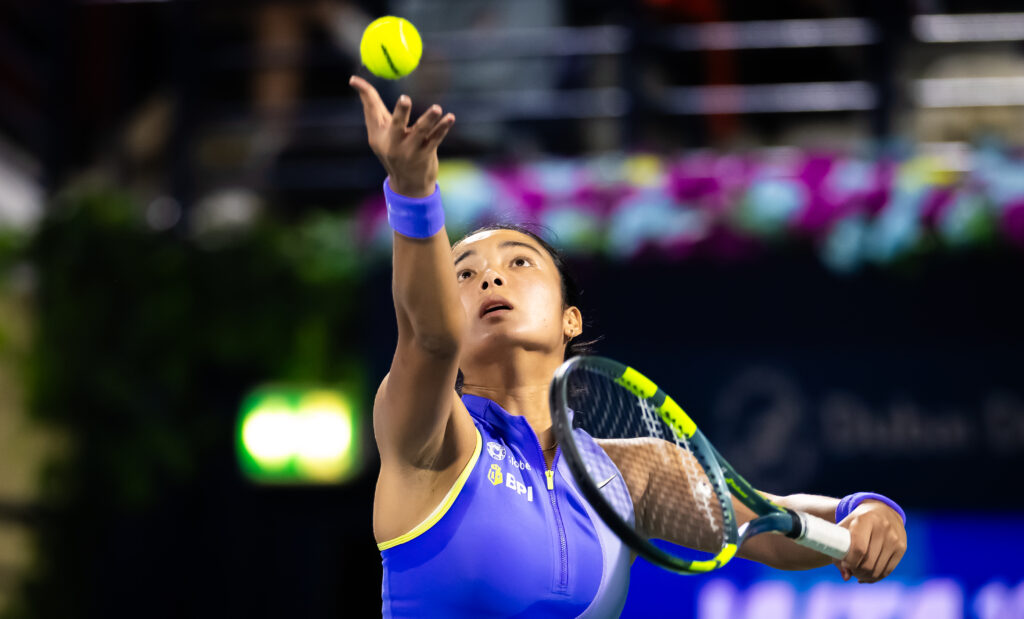 Alexandra Eala of the Philippines serves against Sorana Cirstea of Romania in the third round on Day Four of the Dubai Duty Free Tennis Championships, part of the Hologic WTA Tour at Dubai Duty Free Tennis Stadium on February 18, 2026 in Dubai, United Arab Emirates.