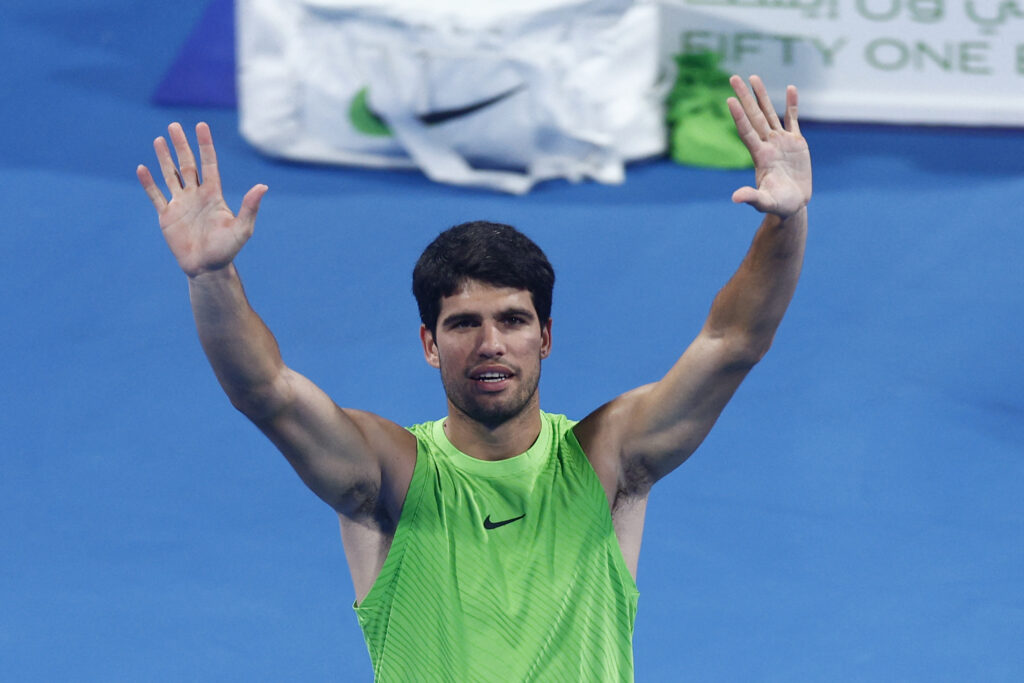 Spain's Carlos Alcaraz reacts defeating France's Valentin Royer in their men's singles match at the Qatar Open tennis tournament in Doha on February 18, 2026.