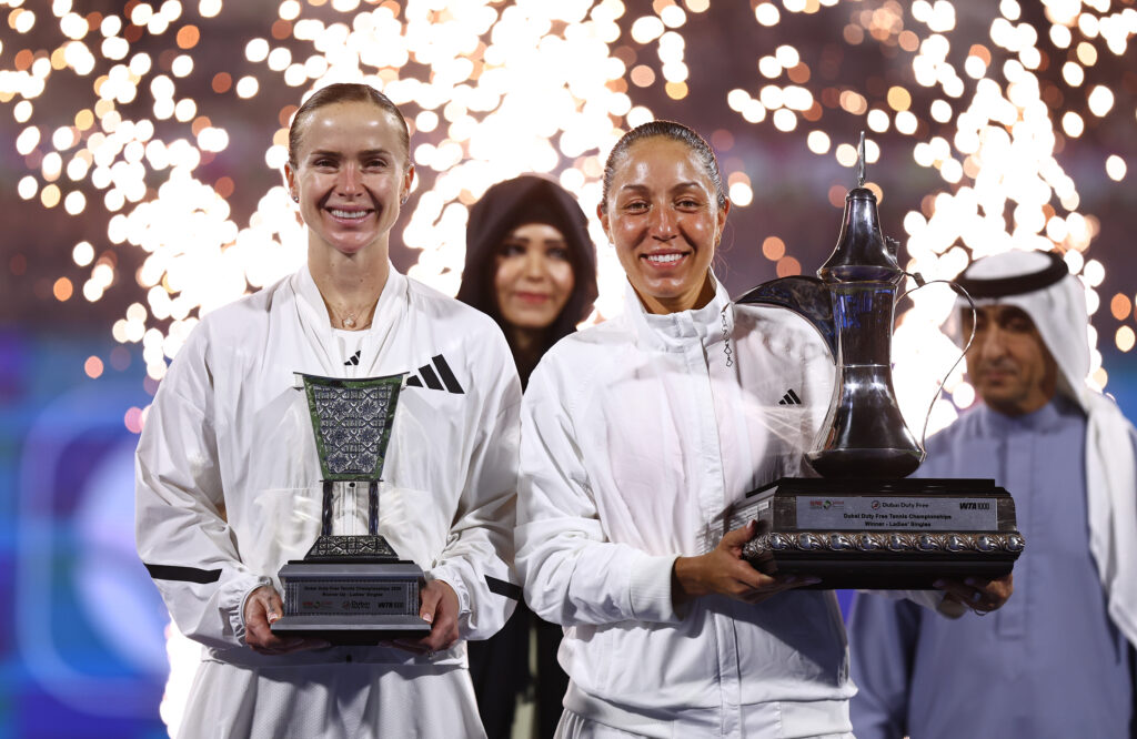 Runner-up, Elina Svitolina of Ukraine and Winner, Jessica Pegula of United States pose at the presentation ceremony after Women's Singles Final match during day seven of the Dubai Duty Free Tennis Championships, part of the Hologic WTA Tour at Dubai Duty Free Tennis Stadium on February 21, 2026 in Dubai, United Arab Emirates.