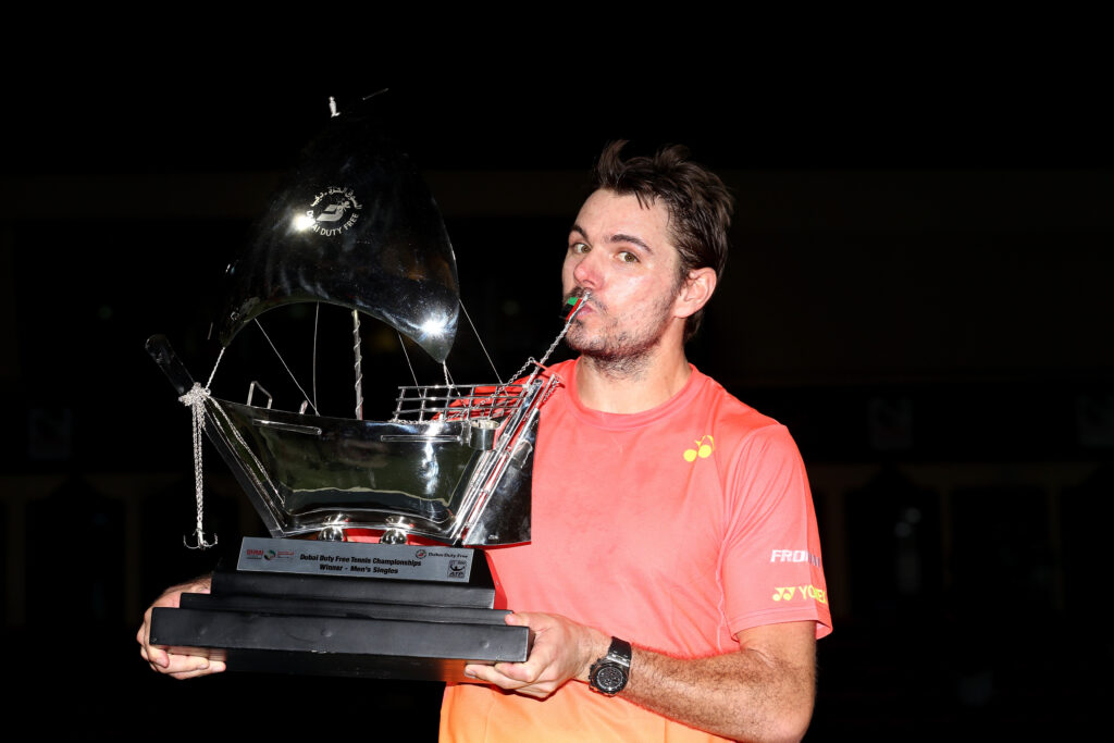 Stan Wawrinka of Switzerland poses with the trophy after beating Marcos Baghdatis of Cyrus to win the ATP Dubai Duty Free Tennis Championship at the Dubai Duty Free Stadium on February on February 27, 2016 in Dubai, United Arab Emirates.