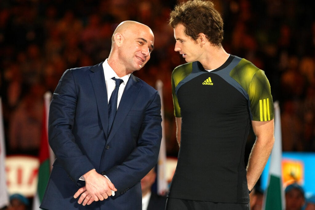 Andy Murray of Great Britain speaks with Andre Agassi during the Final at the Australian Open in 2013.
