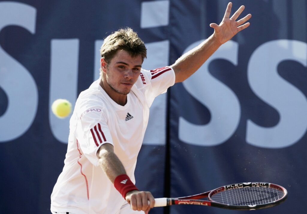 Stanislas Wawrinka of Switzerland plays a backhand during his match against Adrei Pavel of Romania during the first round of the Allianz Suisse Open at the Roy Emerson Arena on July 11, 2006 in Gstaad, Switzerland.
