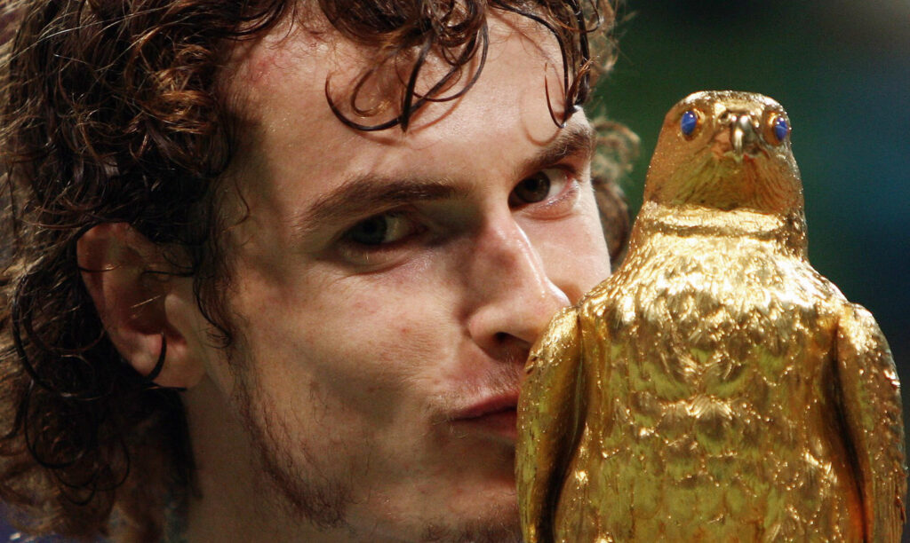 Andy Murray of Britain kisses the trophy after winning the final match against Stanislas Wawrinka of Switzerland in the Qatar Open ATP tournament in Doha, 05 January 2008. Murray warmed up for the Australian Open by clinching his fourth career title with a 6-4, 4-6, 6-2 win over Wawrinka.