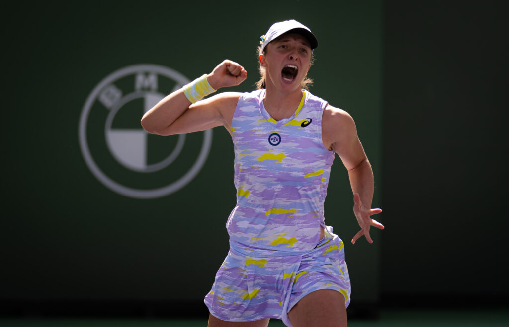Iga Swiatek of Poland reacts to defeating Maria Sakkari of Greece during the Women's Singles final of the 2022 BNP Paribas Open at the Indian Wells Tennis Garden on March 20, 2022 in Indian Wells, California