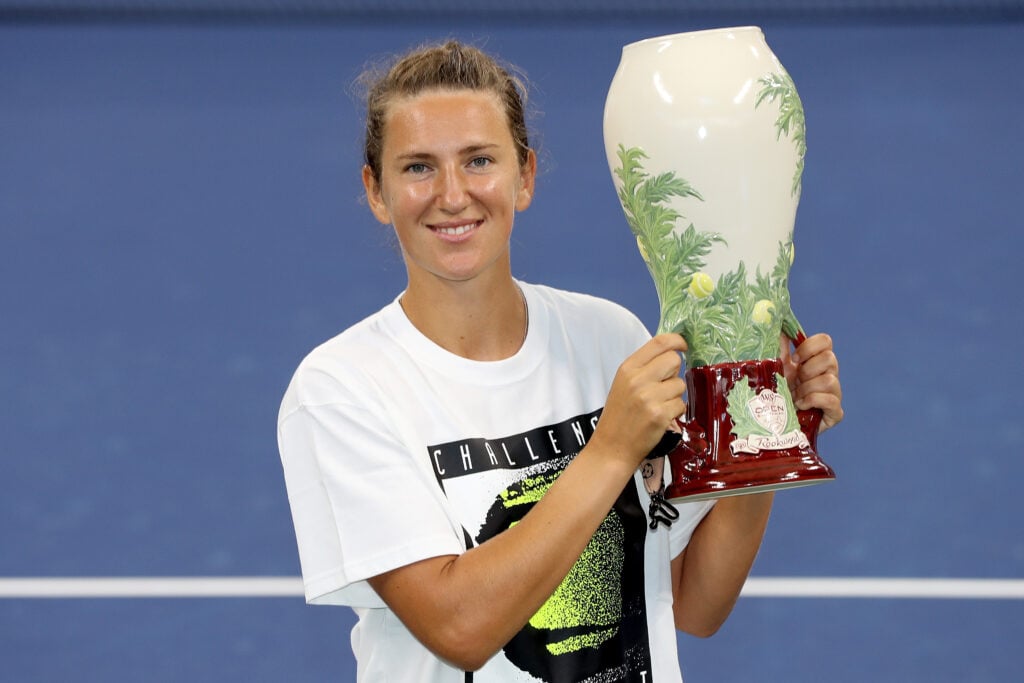 Victoria Azarenka of Belarus poses with the winner's trophy during the Western & Southern Open at the USTA Billie Jean King National Tennis Center on August 29, 2020 in the Queens borough of New York City. Her opponent, Naomi Osaka of Japan, withdrew before the start of their final match.