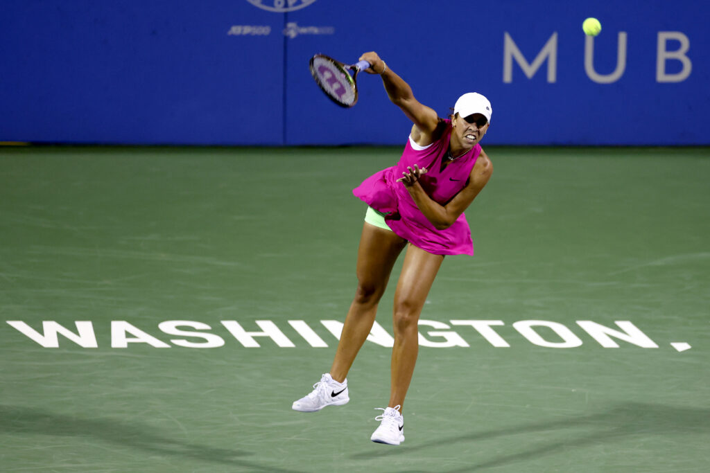 Madison Keys of the United States serves to Qinwen Zheng of China during Day 4 of the Mubadala Citi DC Open at Rock Creek Tennis Center on August 01, 2023 in Washington, DC.