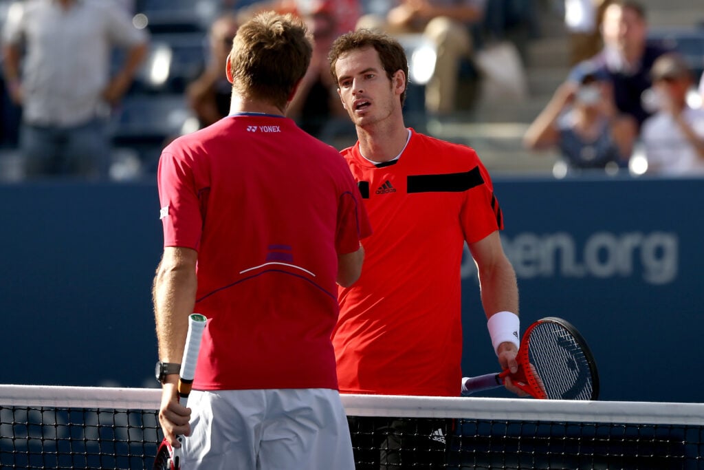 Stanislas Wawrinka of Switzerland shakes hands at the net with Andy Murray of Great Britain after their men's singles quarterfinal match on Day Eleven of the 2013 US Open at USTA Billie Jean King National Tennis Center on September 5, 2013 in the Flushing neighborhood of the Queens borough of New York City.
