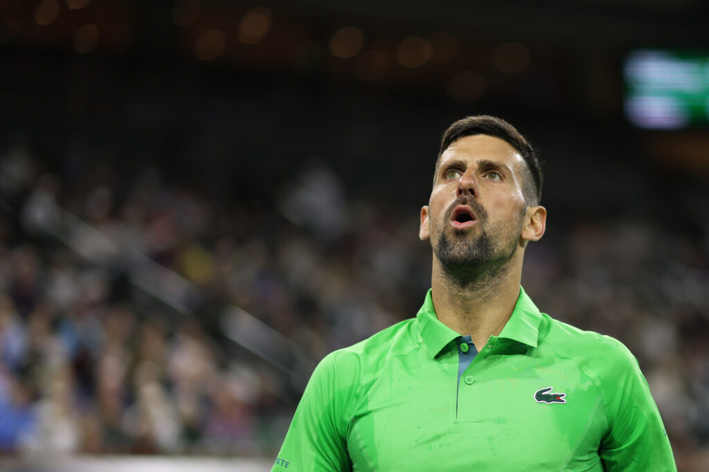 Novak Djokovic of Serbia shows his dejection during his three set defeat against Luca Nardi of Italy in their third round match during the BNP Paribas Open at Indian Wells Tennis Garden on March 11, 2024 in Indian Wells, California.