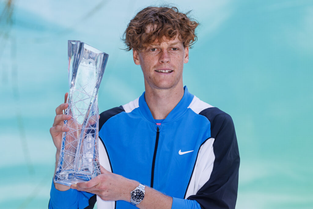 Jannik Sinner of Italy poses with the Butch Buchholz trophy after beating Grigor Dimitrov of Bulgaria in the final of the Miami Open at the Hard Rock Stadium on March 31, 2024 in Miami Gardens, Florida.