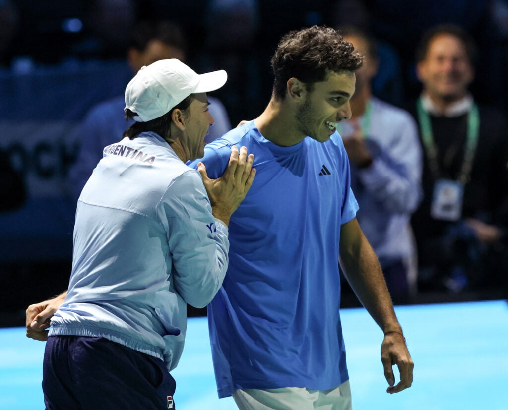 Francisco Cerundolo of Argentina celebrates with aptain Guillermo Coria after beating Jack Draper of Great Britain in their 2024 Davis Cup Finals Group D match at the AO Arena on September 13, 2024 in Manchester, England.