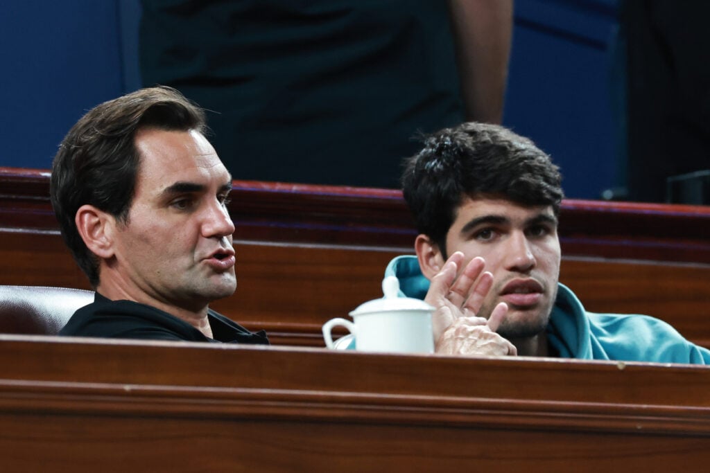 Roger Federer and Carlos Alcaraz react during the match between Jannik Sinner of Italy and Novak Djokovic of Serbia in Men's Singles Final match on Day 14 of 2024 Shanghai Rolex Masters at Qi Zhong Tennis Centre on October 13, 2024 in Shanghai, China.