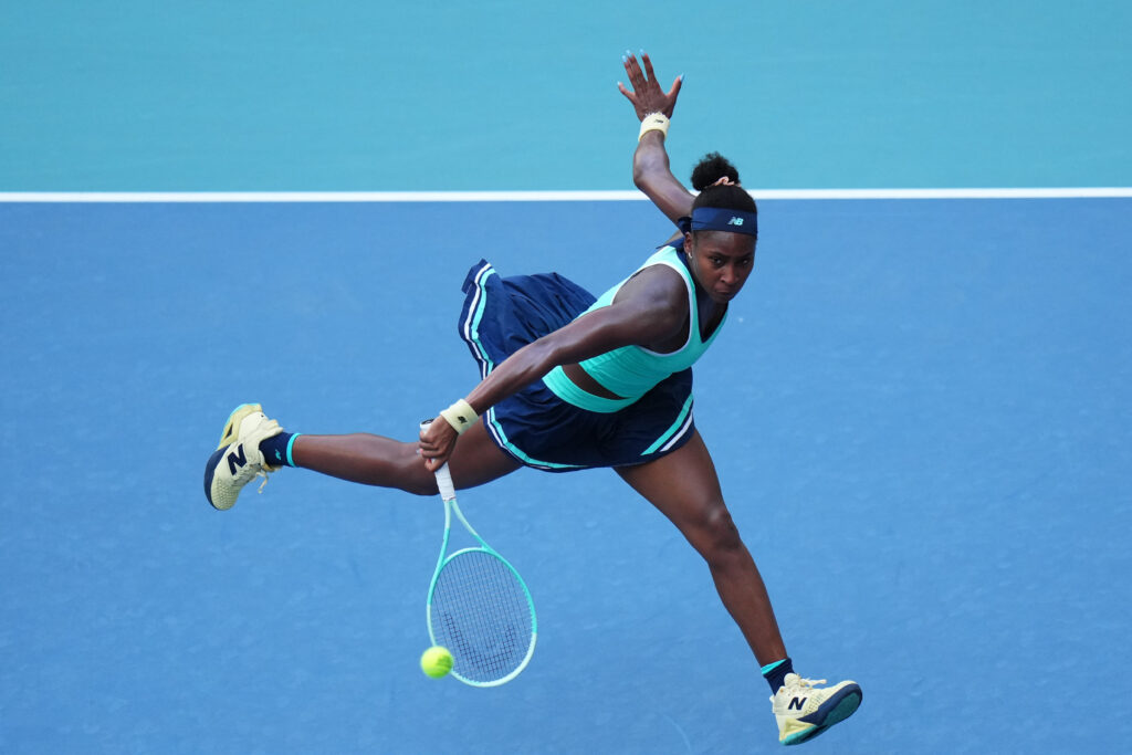 Coco Gauff of the United States returns a shot against Magda Linette of Poland during their match on day 7 of the Miami Open at Hard Rock Stadium on March 24, 2025 in Miami Gardens, Florida.