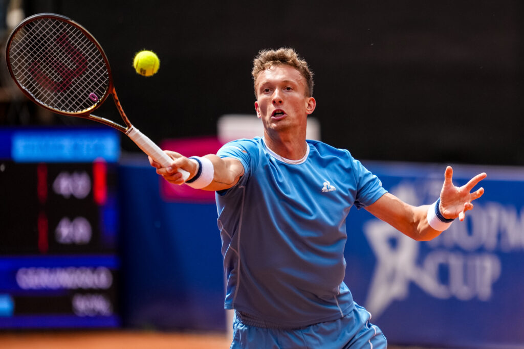 Jiri Lehecka of Czech Republic plays a forehand volley in his Men's Singles Second Round match against Francisco Cerundolo of Argentina during Day Five of the Bitpanda Hamburg Open at Am Rothenbaum on May 21, 2025 in Hamburg, Germany.