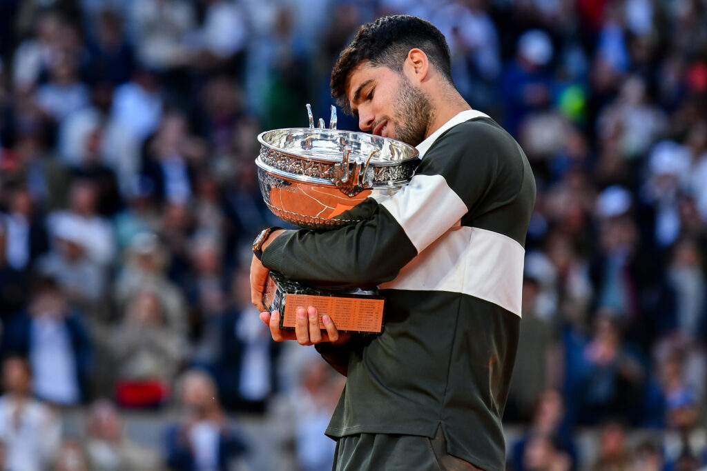 Carlos Alcaraz celebrates after winning the 2025 French Open