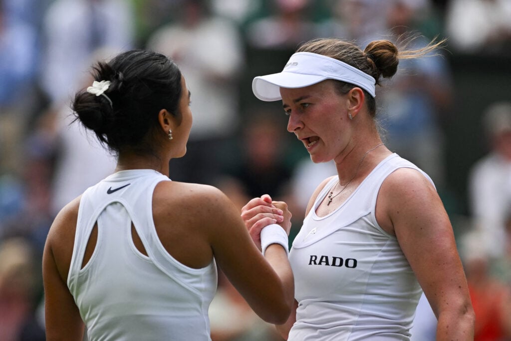 Czech Republic's Barbora Krejcikova (R) shakes hands with Philippines' Alexandra Eala after winning their women's singles first round tennis match on the second day of the 2025 Wimbledon Championships at The All England Lawn Tennis and Croquet Club in Wimbledon, southwest London, on July 1, 2025.