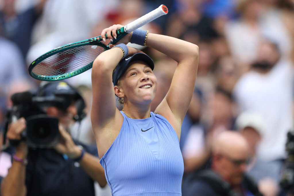 Amanda Anisimova of the United States reacts after defeating Iga Swiatek of Poland following the Women's Quarterfinal match on Day Eleven of the 2025 US Open at USTA Billie Jean King National Tennis Center on September 3, 2025 in the Flushing neighborhood of the Queens borough of New York City.