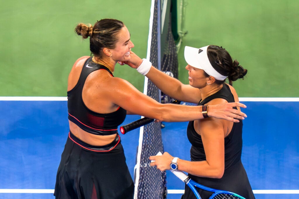 Aryna Sabalenka (L) and Jessica Pegula of the United States (R) shake hand after the Women's Singles Semifinal match on day eight of the 2025 Wuhan Open at Optics Valley International Tennis Center on October 11, 2025 in Wuhan, China.