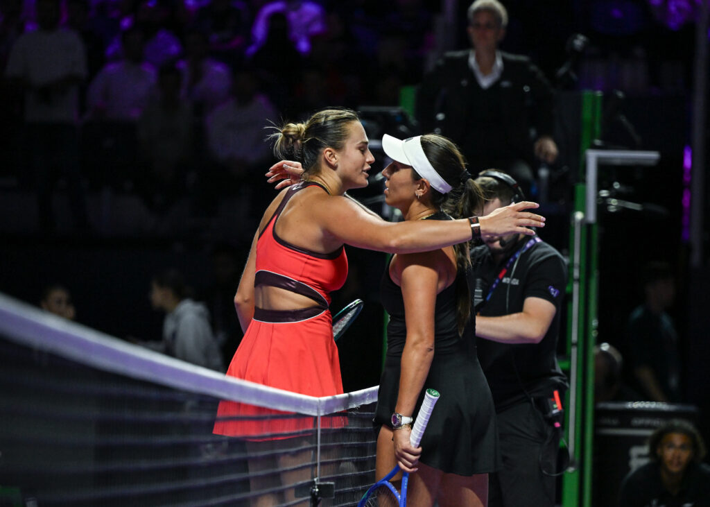 Aryna Sabalenka (L) wins against Jessica Pegula (R) of the United States during their group-stage match on Day 4 of the 2025 WTA Finals, part of the Hologic WTA Tour, at King Saud University Indoor Arena in Riyadh, Saudi Arabia, on November 4, 2025.