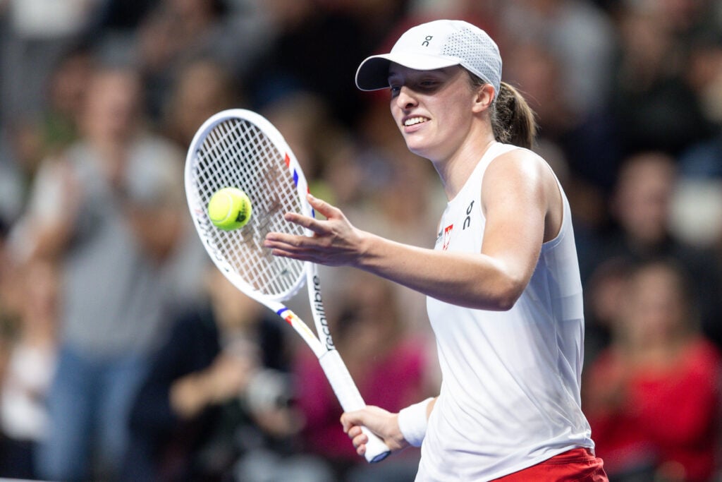 Iga Swiatek in action at the Billie Jean King Cup in 2025