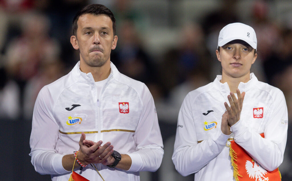 Dawid Celt and Iga Swiatek pictured together at the 2025 Billie Jean King Cup