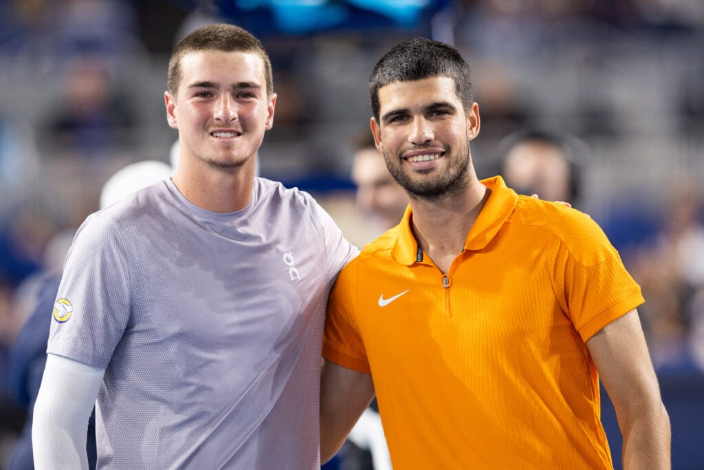 Joao Fonseca and Carlos Alcaraz pose for a picture together at the 2025 Miami Invitational