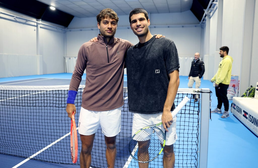 Carlos Alcaraz of Spain trains with Flavio Cobolli of Italy in preparation for the Australian Open 2026 in El Palmar on December 17, 2025 in Villena, Spain.