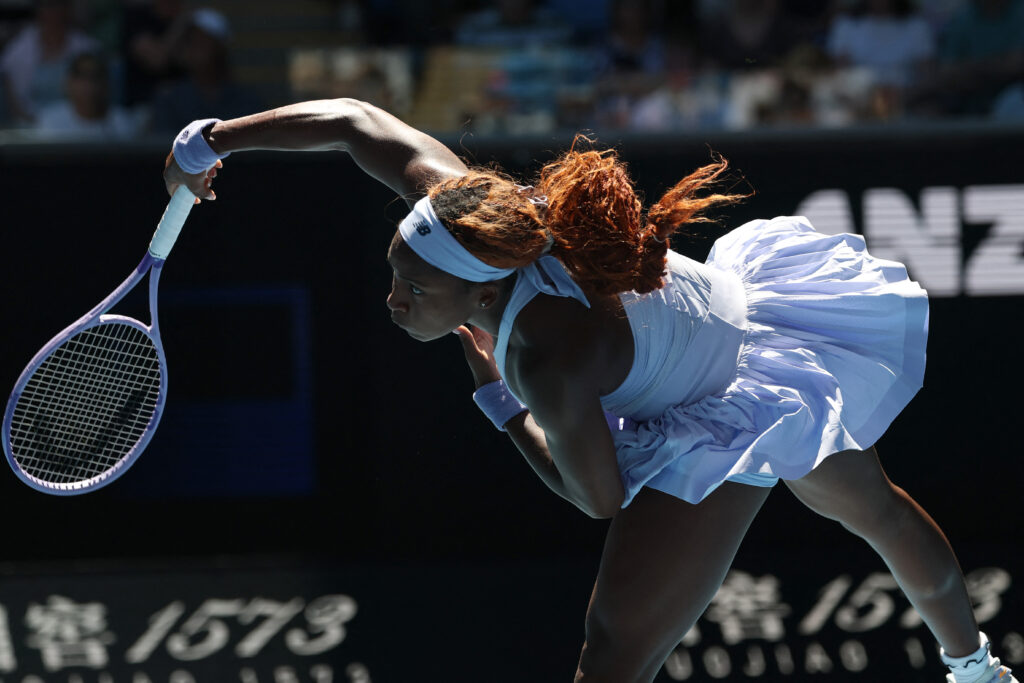 USA's Coco Gauff Serves to Serbia's Olga Danilovic during their women's singles match on day four of the Australian Open tennis tournament in Melbourne on January 21, 2026.