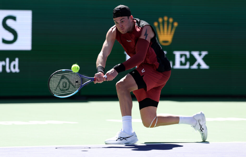 Jack Draper of Great Britain plays a backhand against Roberto Bautista Agut of Spain in their second round match of the BNP Paribas Open at Indian Wells Tennis Garden on March 07, 2026 in Indian Wells, California.