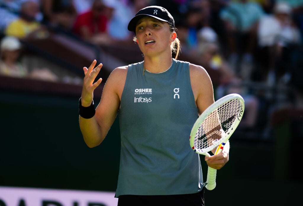 Iga Swiatek of Poland in action against Elina Svitolina of Ukraine in the quarter-final on Day 9 of the BNP Paribas Open at Indian Wells Tennis Garden on March 12, 2026 in Indian Wells, California.