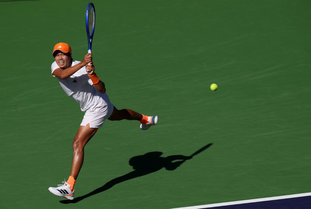 Learner Tien of the United States plays a backhand against Alejandro Davidovich Fokina of Spain in their fourth round match of the BNP Paribas Open at Indian Wells Tennis Garden on March 10, 2026 in Indian Wells, California.