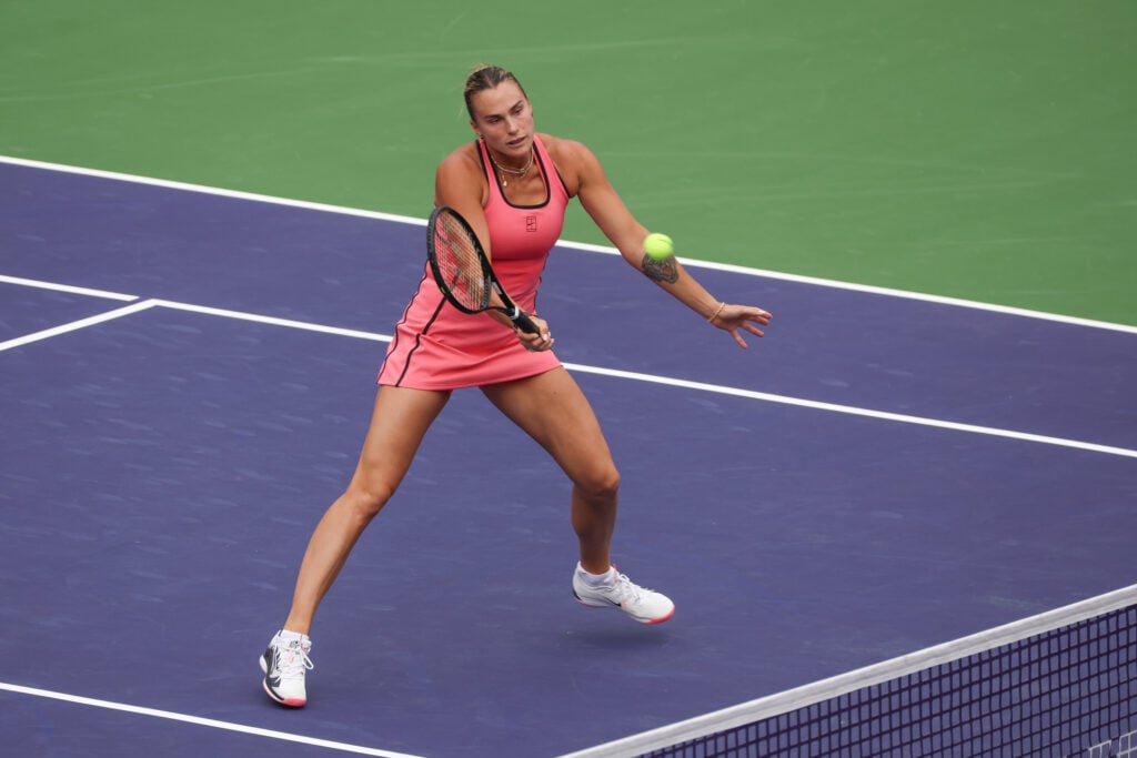 Aryna Sabalenka hits a volley at Indian Wells in 2026