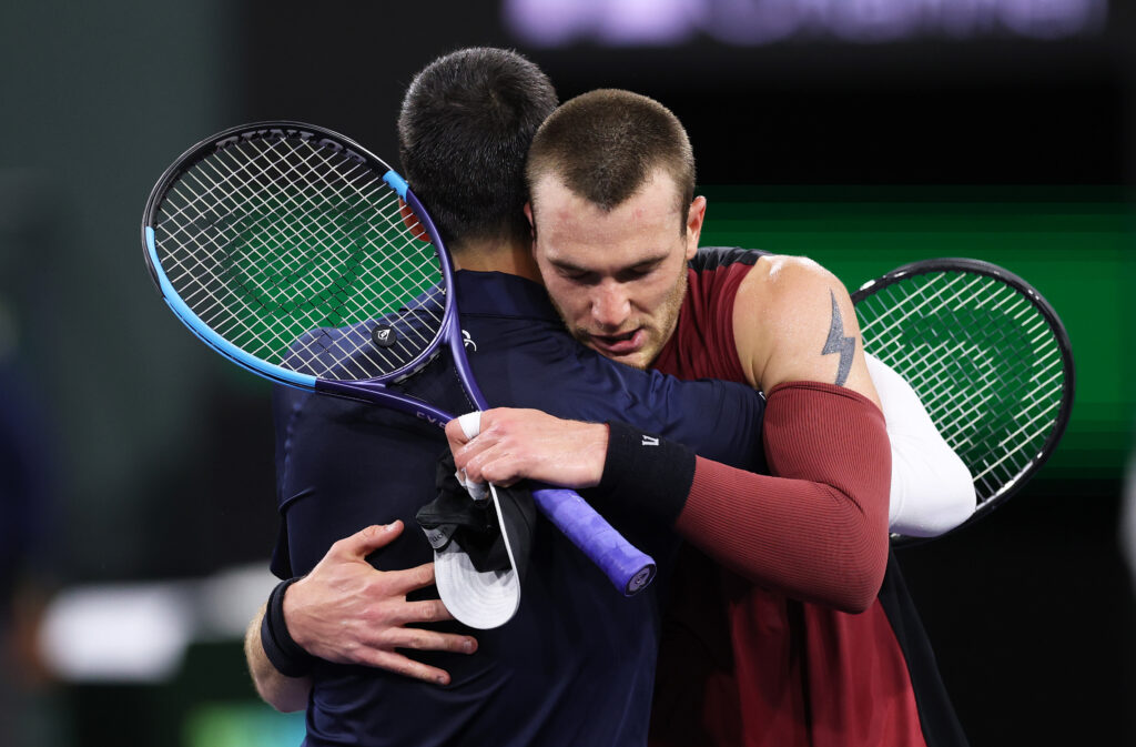 Jack Draper and Novak Djokovic embrace after their match at Indian Wells in 2026
