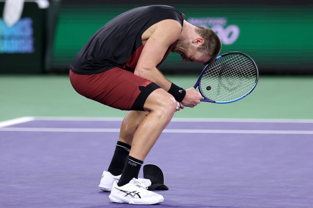 Jack Draper crouches over in celebration at Indian Wells in 2026
