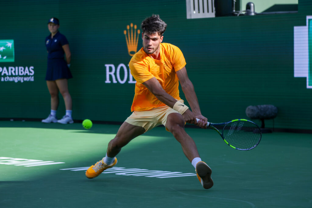 Carlos Alcaraz (ESP) hits a backhand during the BNP Paribas Open on March 14, 2026 at Indian Wells Tennis Garden in Indian Wells, CA.