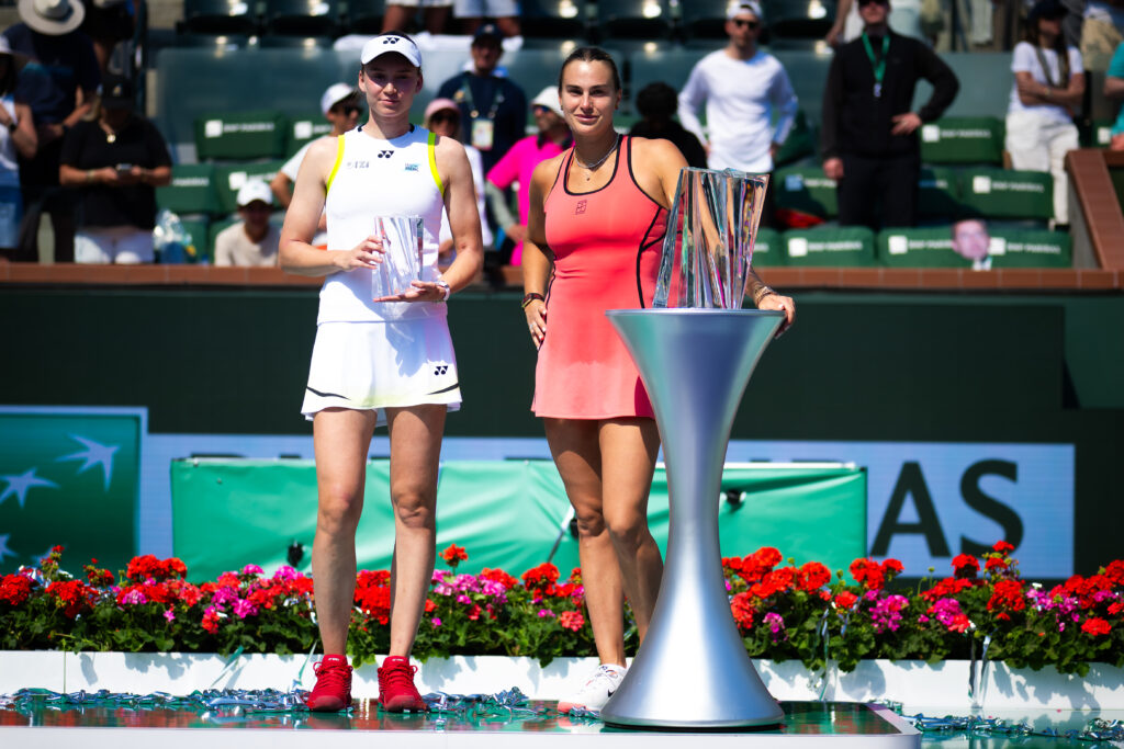 Elena Rybakina and Aryna Sabalenka pose with their trophies