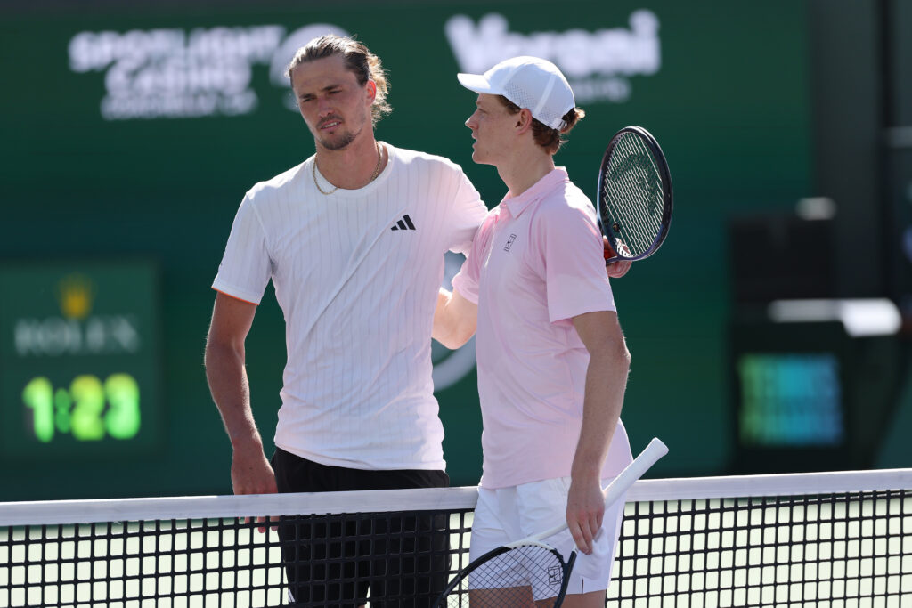 Alexander Zverev of Germany, left, embraces Jannik Sinner of Italy after a loss in their Men's Singles Semifinals match on Day 11 of the BNP Paribas Open at Indian Wells Tennis Garden on March 14, 2026 in Indian Wells, California.