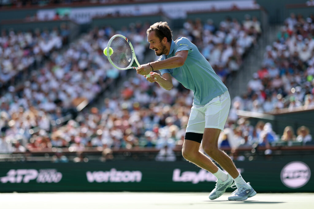 Daniil Medvedev hits a backhand