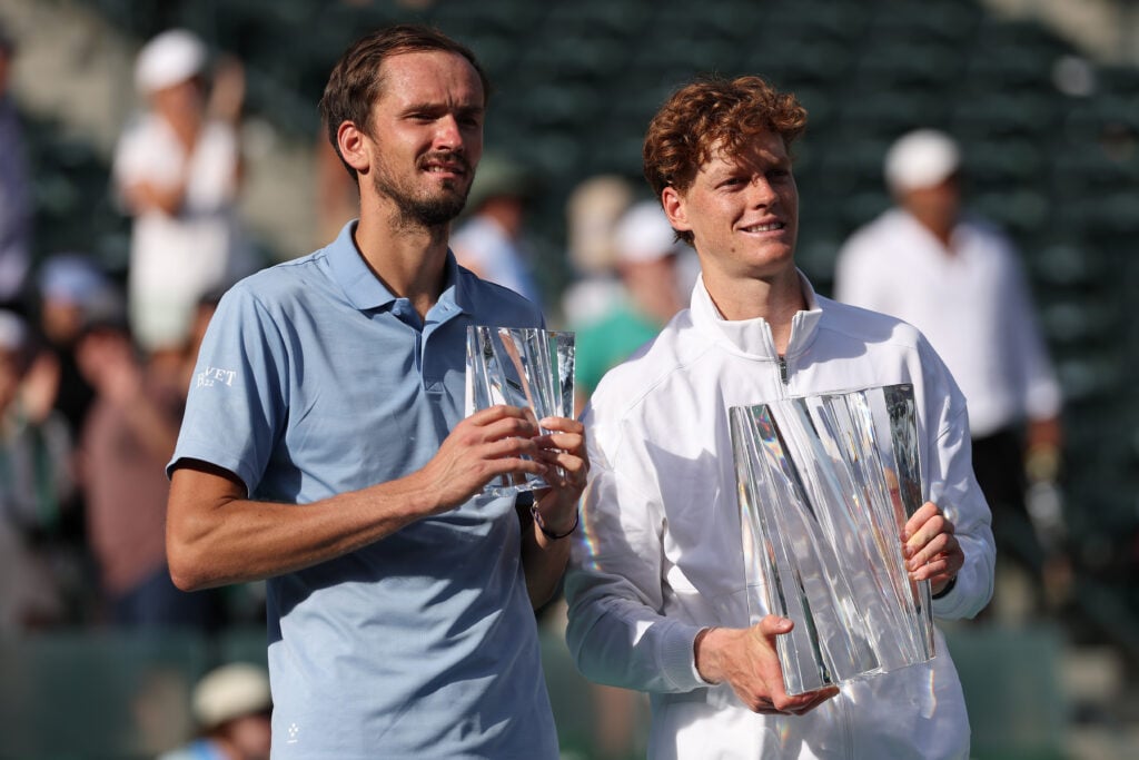Daniil Medvedev, left, holds the second place trophy and Jannik Sinner of Italy holds the championship trophy following their Men's Singles Finals match on Day 12 of the BNP Paribas Open at Indian Wells Tennis Garden on March 15, 2026 in Indian Wells, California.