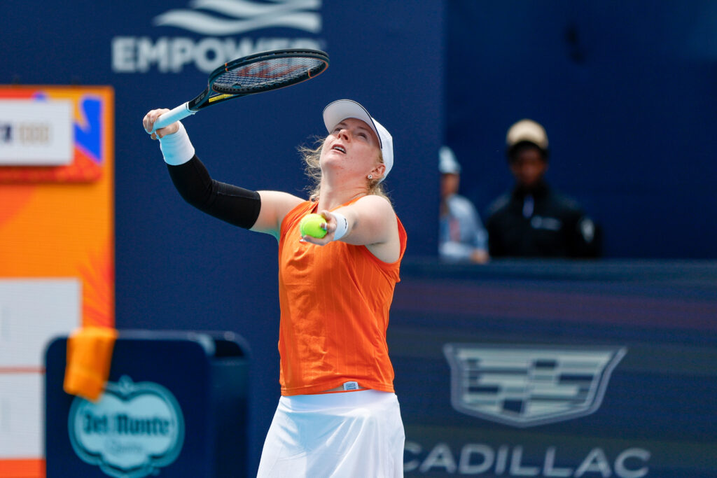 Francesca Jones serves to Venus Williams at the 2026 Miami Open