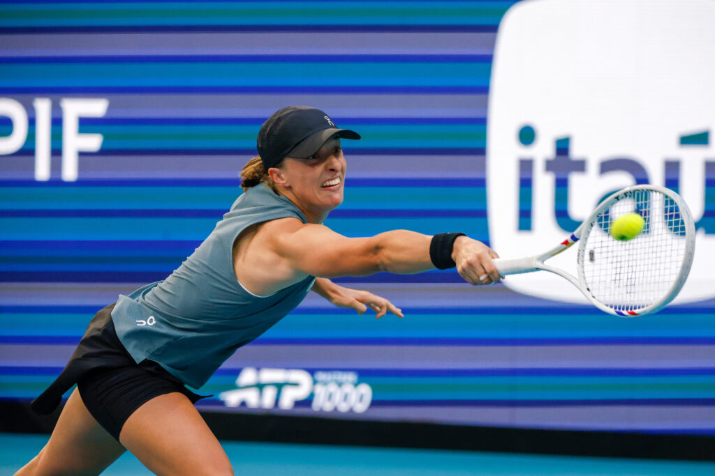 Iga Swiatek (POL) in action during a Women's Singles Round 1 match against Magda Linette (POL) at the Miami Open on March 19, 2026, at Hard Rock Stadium in Miami Gardens, Florida