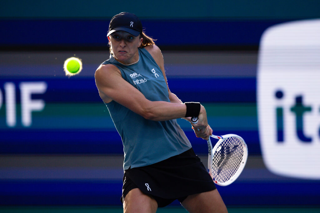 Iga Swiatek of Poland competes against Magda Linette of Poland during their match on Day 3 of the Miami Open at Hard Rock Stadium in Miami Gardens, Florida, on March 19, 2026.