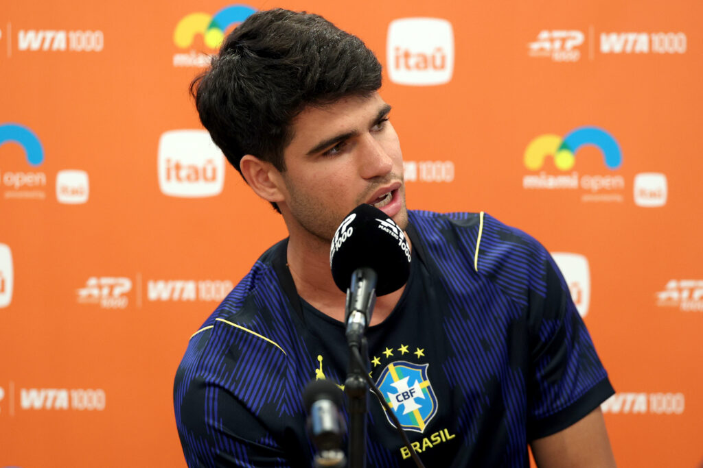 Carlos Alcaraz of Spain fields questions from the media on Day 3 of the Miami Open Presented by Itau at Hard Rock Stadium on March 19, 2026 in Miami Gardens, Florida.