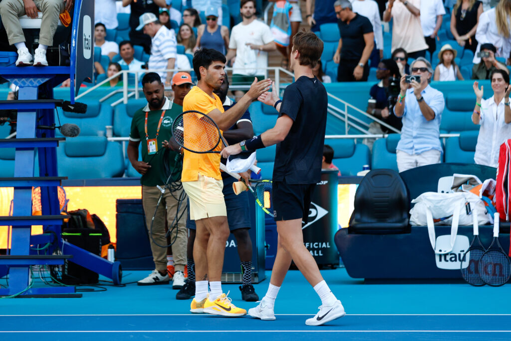 Seb Korda and Carlos Alcaraz shake hands
