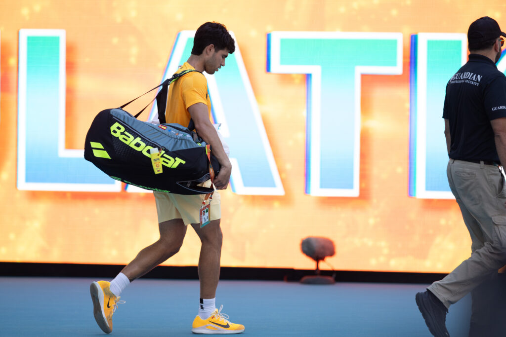 Carlos Alcaraz of Spain leaves the court after his defeat against Sebastian Korda of the United States during their match on Day 6 of the Miami Open at Hard Rock Stadium in Miami Gardens, Florida, on March 22, 2026.