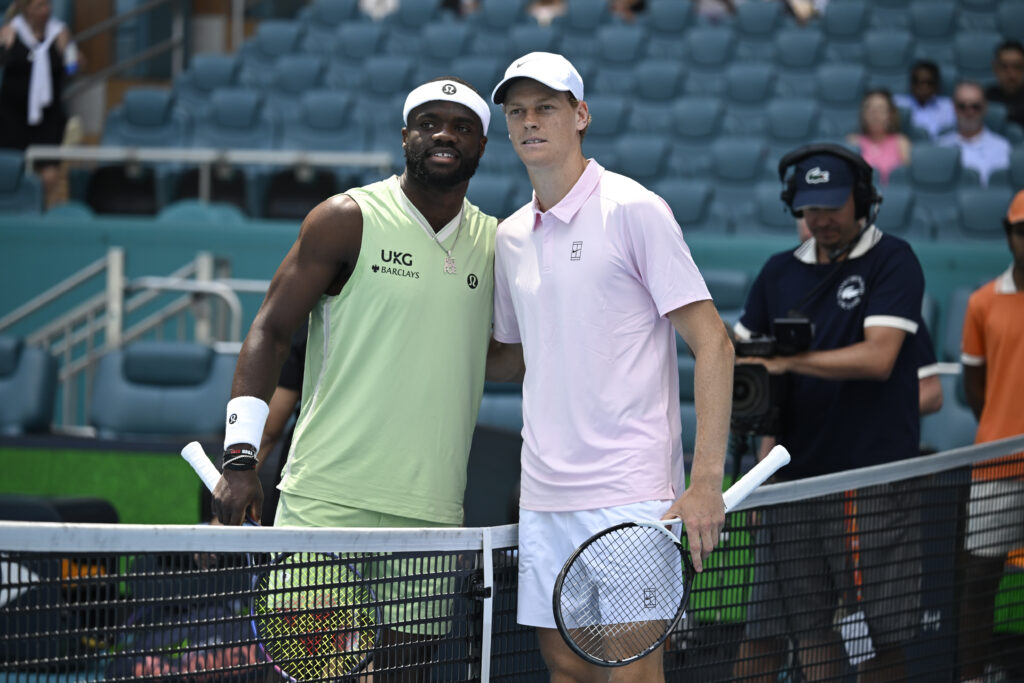 Jannik Sinner of Italy, and Frances Tiafoe of the United States pose for a photo, prior to their men's quarterfinal match of the Miami Open on March 26, 2026, Hard Rock Stadium in Miami Gardens, Florida.