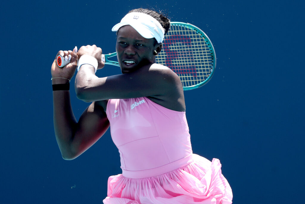 Victoria Mboko of Canada returns a shot to Mirra Andreeva on Day 7 of the Miami Open Presented by Itau at Hard Rock Stadium on March 23, 2026 in Miami Gardens, Florida.