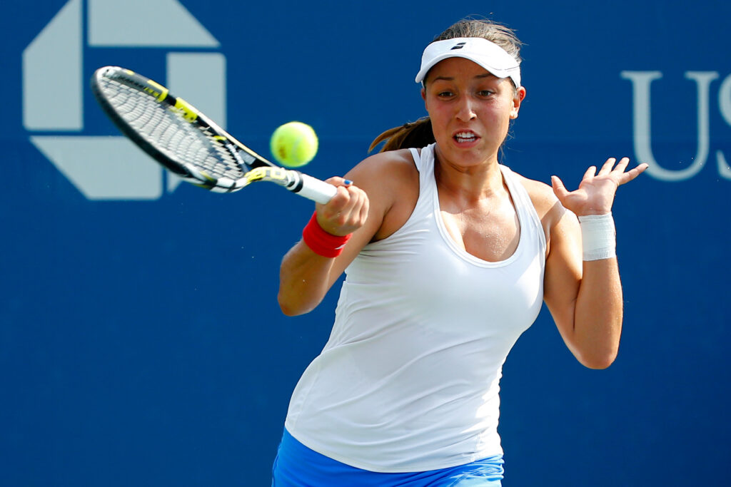 Jessica Pegula of the United States returns a shot against Dominika Cibulkova of Slovakia during their Women's Singles Second Round match on Day Three of the 2015 US Open at the USTA Billie Jean King National Tennis Center on September 2, 2015 in the Flushing neighborhood of the Queens borough of New York City.