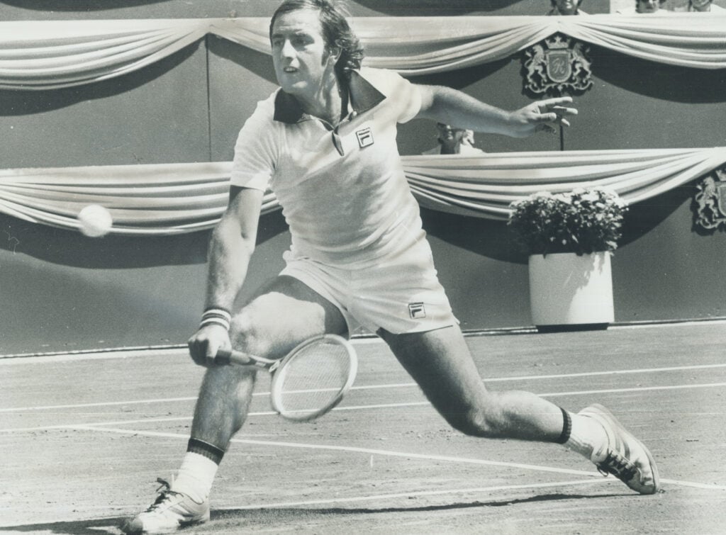 Paulo Bertolucci of Italy lunges to make backhand return to opponent Ismail El Shafei of Egypt during first-round action at the new -million Tennis Centre at York University yesterday. Match; which Bertolucci won; 6-3; 4-6; 6-2; was one of opening contests of the Rothmans Canadian Open tennis championships. The facilities for the centre was completed with only about 18 hours to spare.