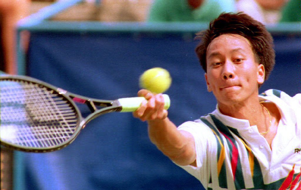 Michael Chang of the U.S. hits the ball to Patrick McEnroe of the U.S., 04 September, 1992 at the U.S. Open. Chang won the match 6-3, 6-3, 6-4.