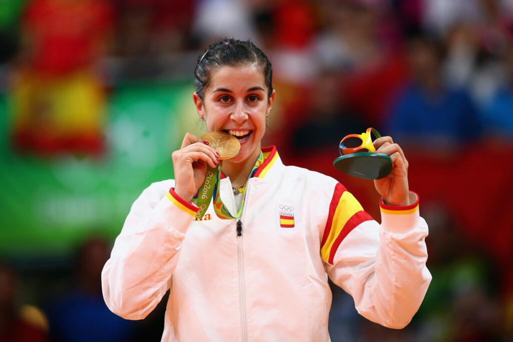 Gold medalist Carolina Marin of Spain celebrates during the medal ceremony after the Women's Singles Badminton competition on Day 14 of the Rio 2016 Olympic Games at Riocentro - Pavilion 4 on August 19, 2016 in Rio de Janeiro, Brazil.